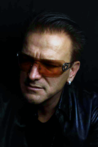 Side-lit portrait of Pave Sfera as Bono